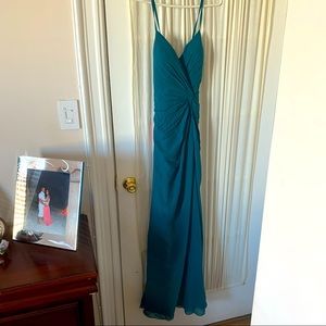 Bridesmaid size 4 from JJs house never been worn . Brand new